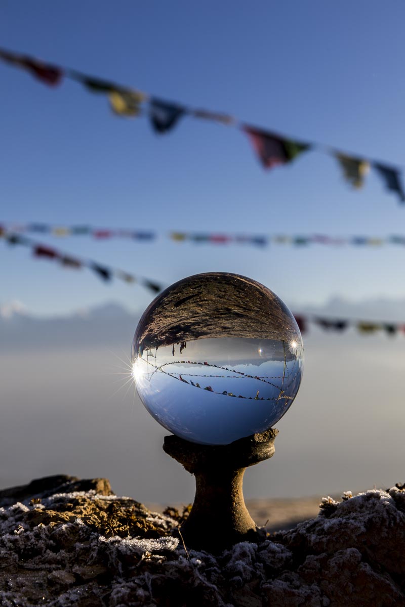 Nepal Sailung - View of the Himalayan Range and prayer flags through a lensball on Sailung Peak - November 11, 2017