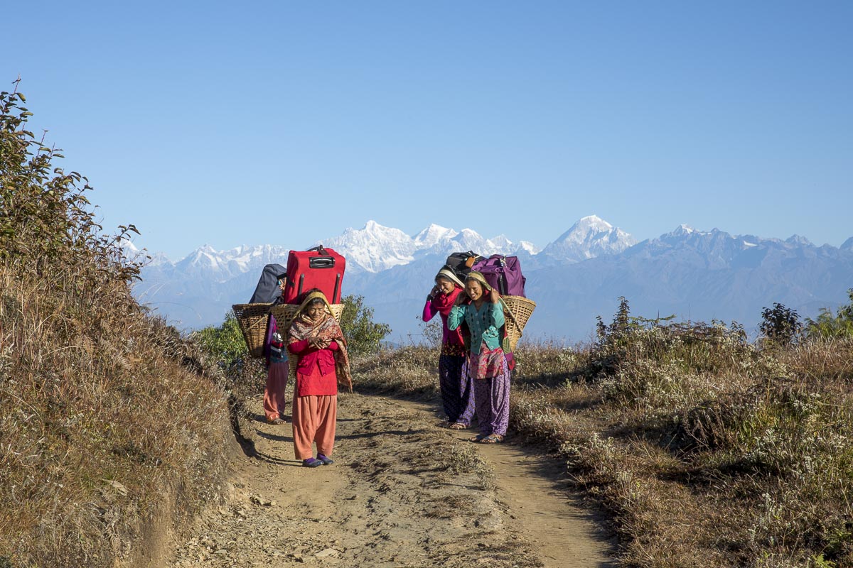 Nepal Sailung - Lady porters carrying luggage in baskets on track to Teksingh - November 12, 2017