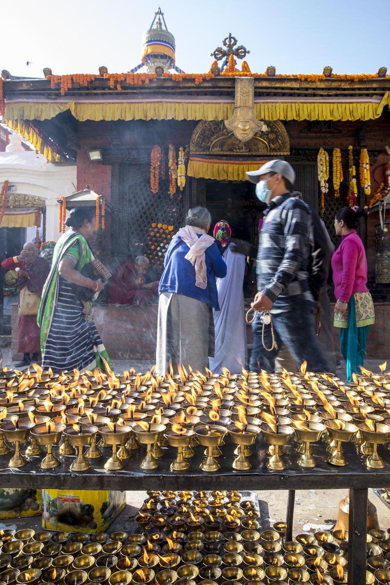 Nepal Sailung - Butter lamps burning outside the Boudhanath Stupa in Kathamandu - November 14, 2017